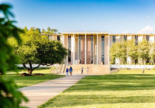 Students walking in front of Ramsey Library